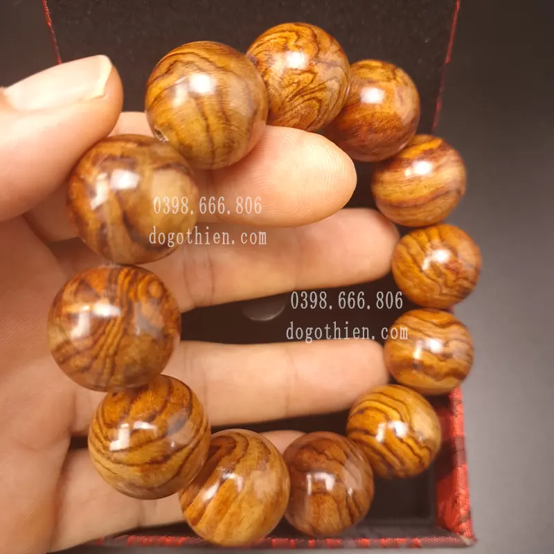 title% Vòng tay gỗ sưa đỏ mặt quỷ
